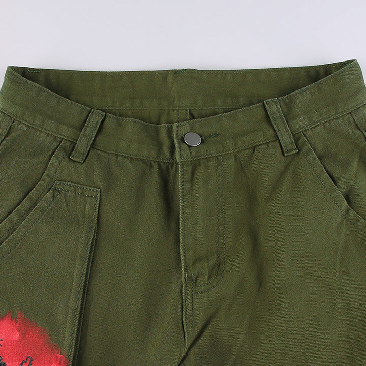 Pantalon cargo femme à motif, kaki, taille basse, coupe évasée, S à L. Matières : Polyester, Spandex. Poches cargo pratiques. Image d'un pantalon cargo vert.