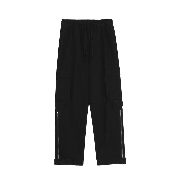 Un pantalon cargo baggy noir avec fermeture éclair pour femme, taille M à 3XL. Coupe large et élastique à la taille pour un confort inégalé. Fermeture éclair le long de la jambe pour une touche d'originalité. Style street féminin.